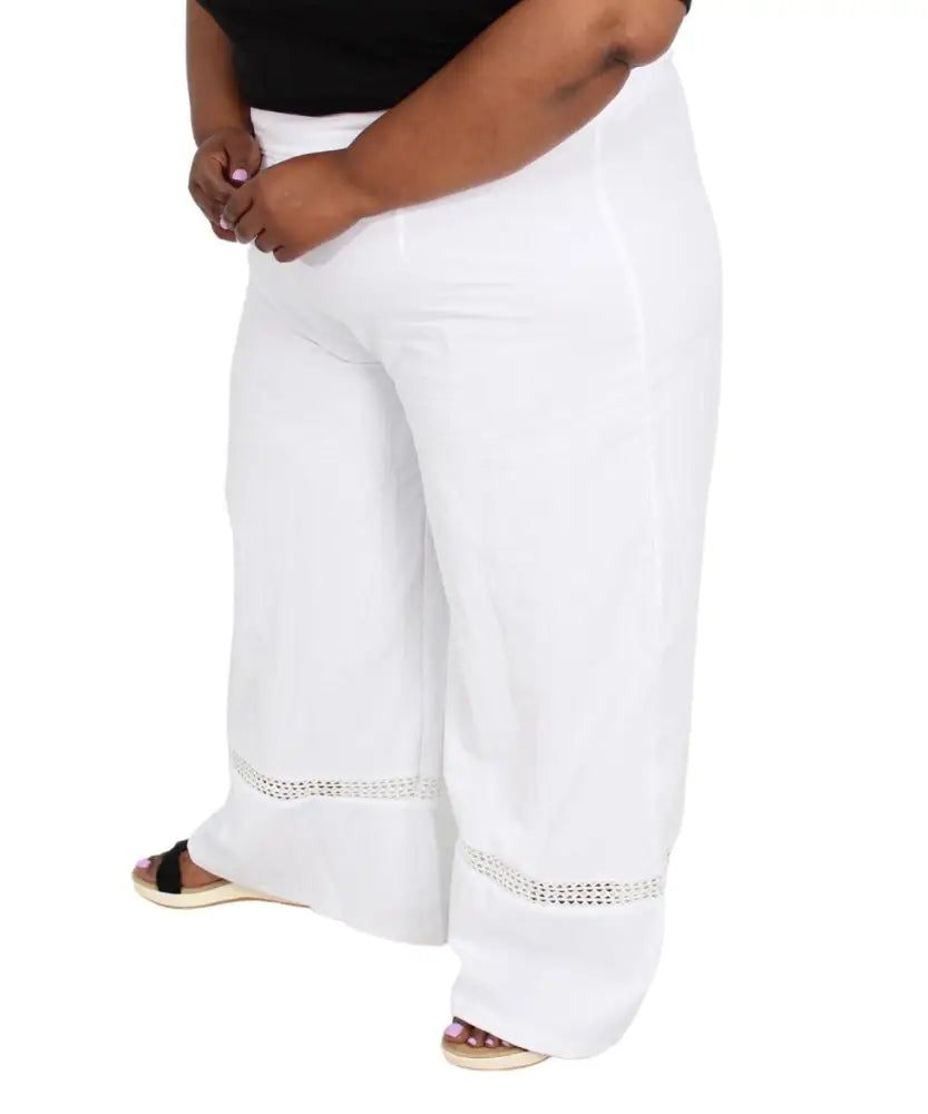 White wide-leg Crochet Washer Cotton Pants featuring lace inserts near the hem