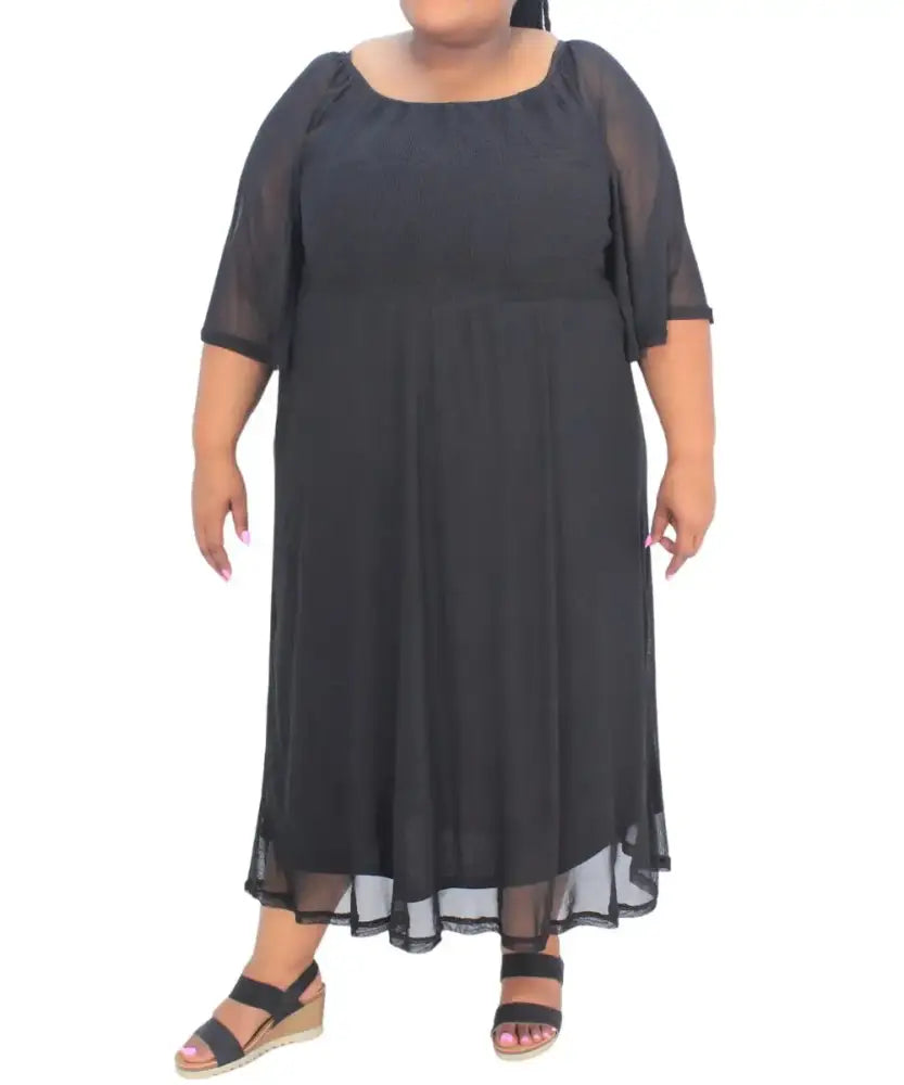 Black plus-size ladies plain ruched flare dress with sheer sleeves and flowy skirt