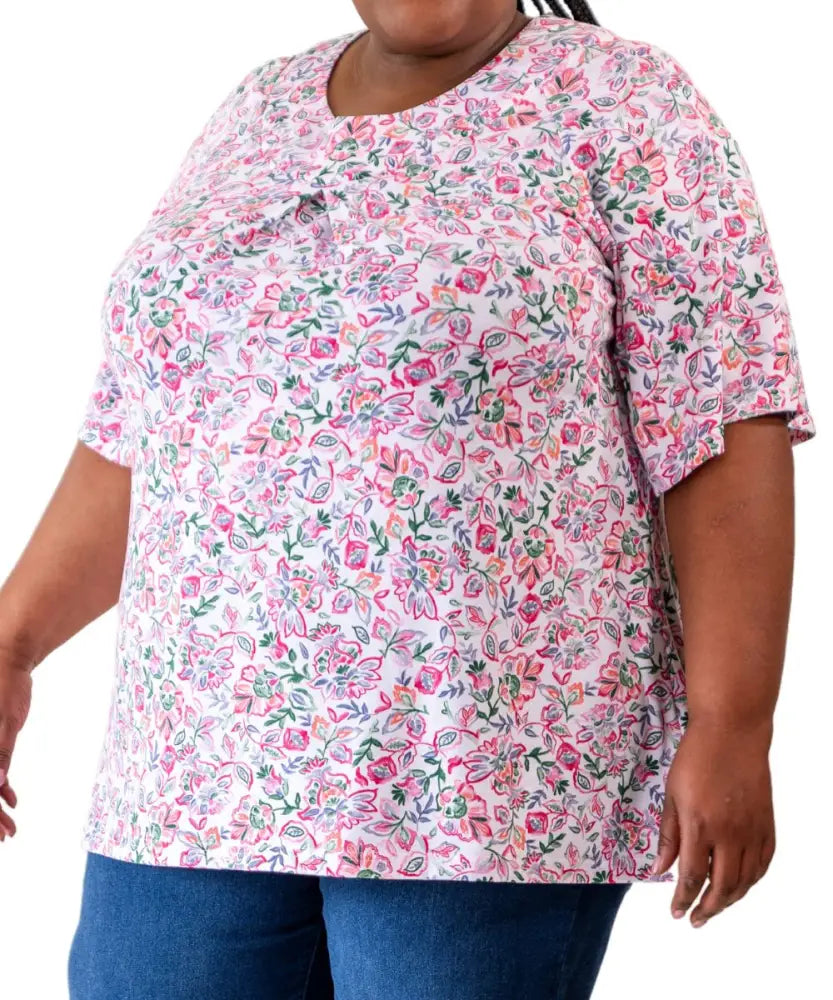 Floral print short-sleeved tunic worn by a model showcasing Ladies Printed Fancy Tunic