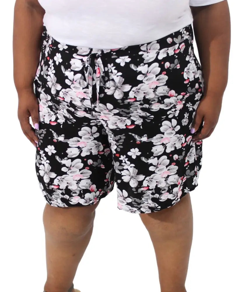 Floral print rayon shorts with black background and white, pink flowers for ladies